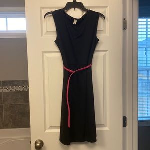 Black, knee length dress.